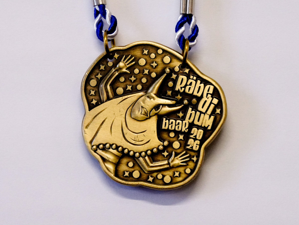 agentur guldin gmbh, Baar, Grafikagentur, Fasnachtsplakette Räbefasnacht Baar 2026, bronze, Fasnachtsgesellschaft Baar