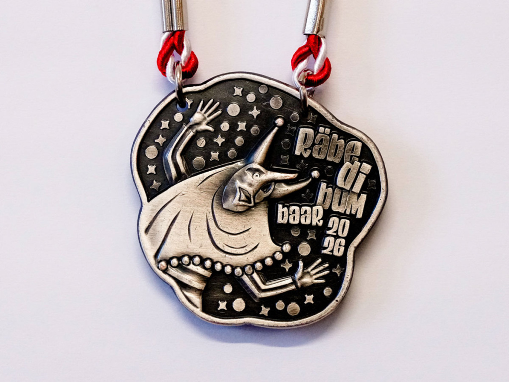 agentur guldin gmbh, Baar, Grafikagentur, Fasnachtsplakette Räbefasnacht Baar 2026, silber, Fasnachtsgesellschaft Baar